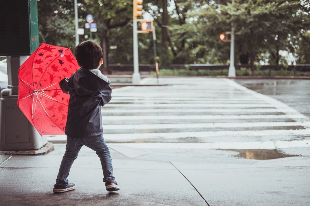 Waiting for the bus in the rain